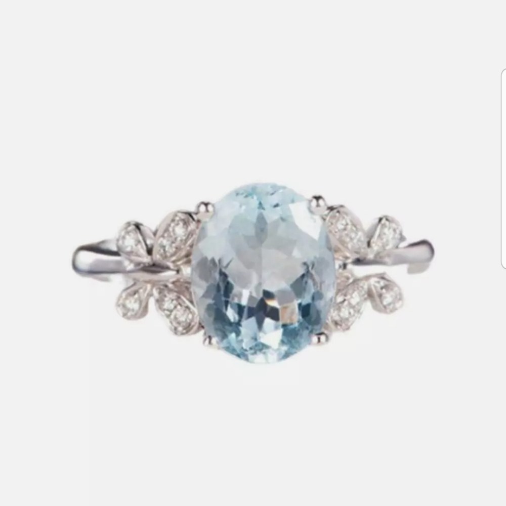 **New silver toned sky blue cubic Zirconia ring - Picture 3 of 12